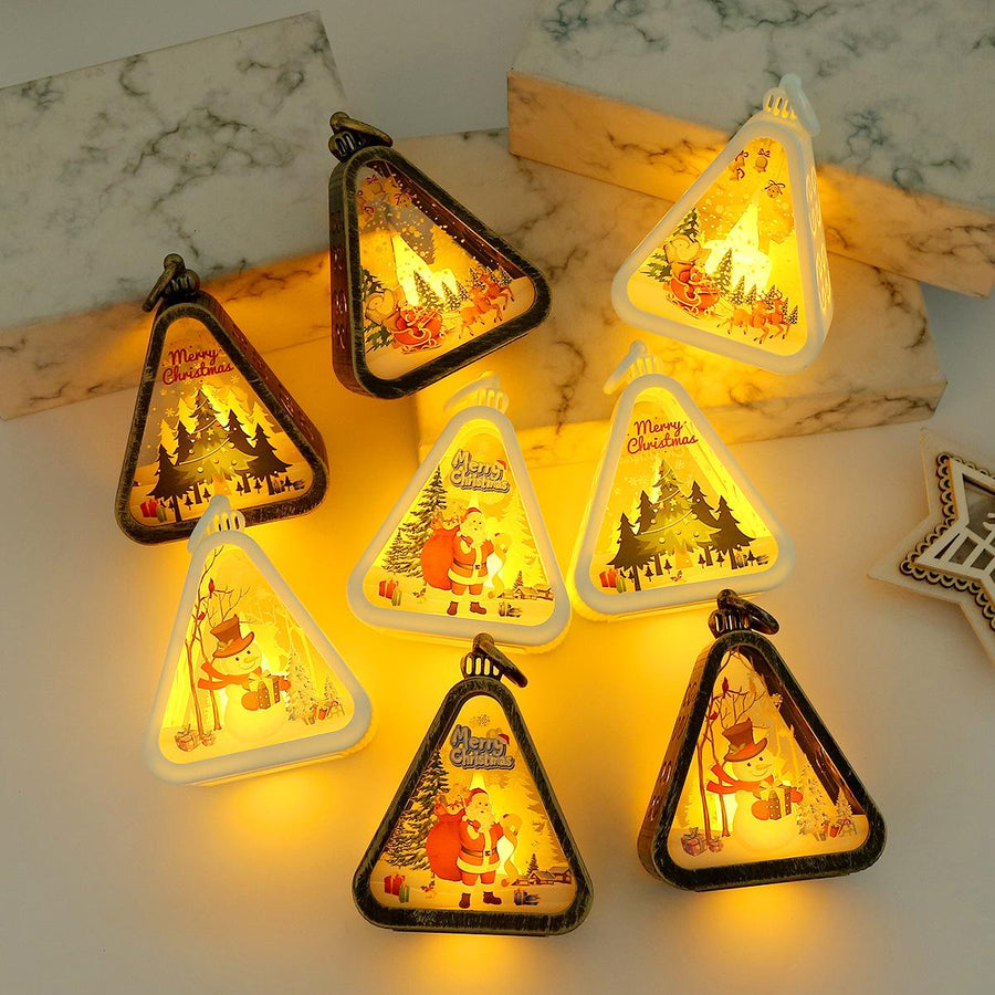 [gallery] Christmas retro LED lanterns — lit acrylic triangles with Santa, tree, and snowman scenes