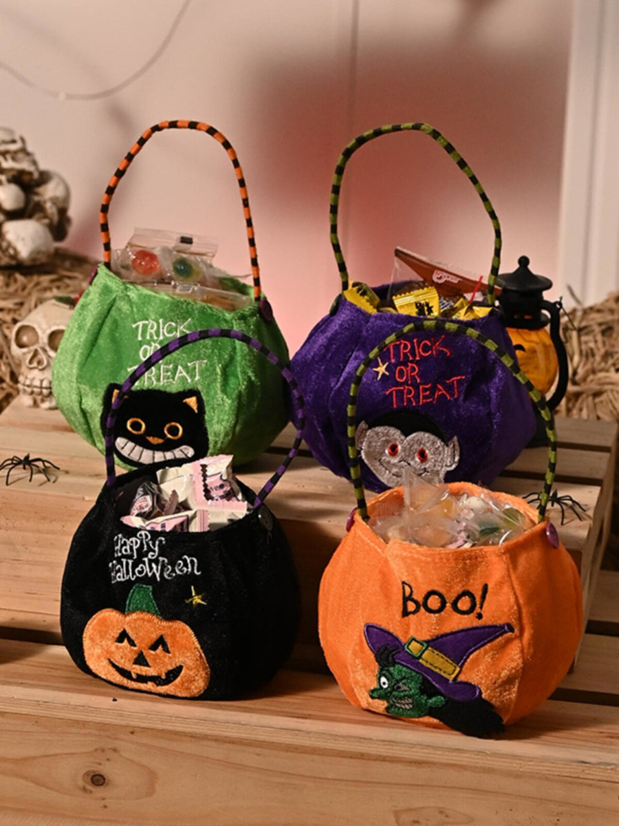 [gallery] Halloween plush candy bags — assorted pumpkin, cat, witch, and BOO styles filled with candy