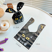 [variant] Black cat bunny-ear treat bag with moon and star design