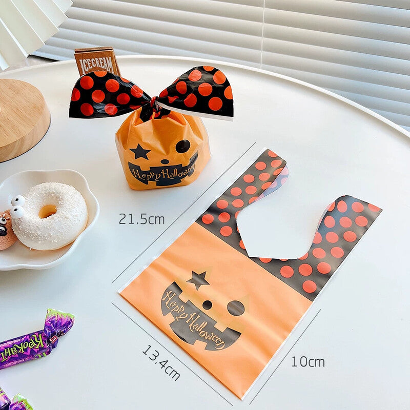 Pumpkin bunny-ear treat bag with orange polka-dot design