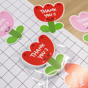 [gallery] Red, pink, and yellow flower thank-you cards laid out
