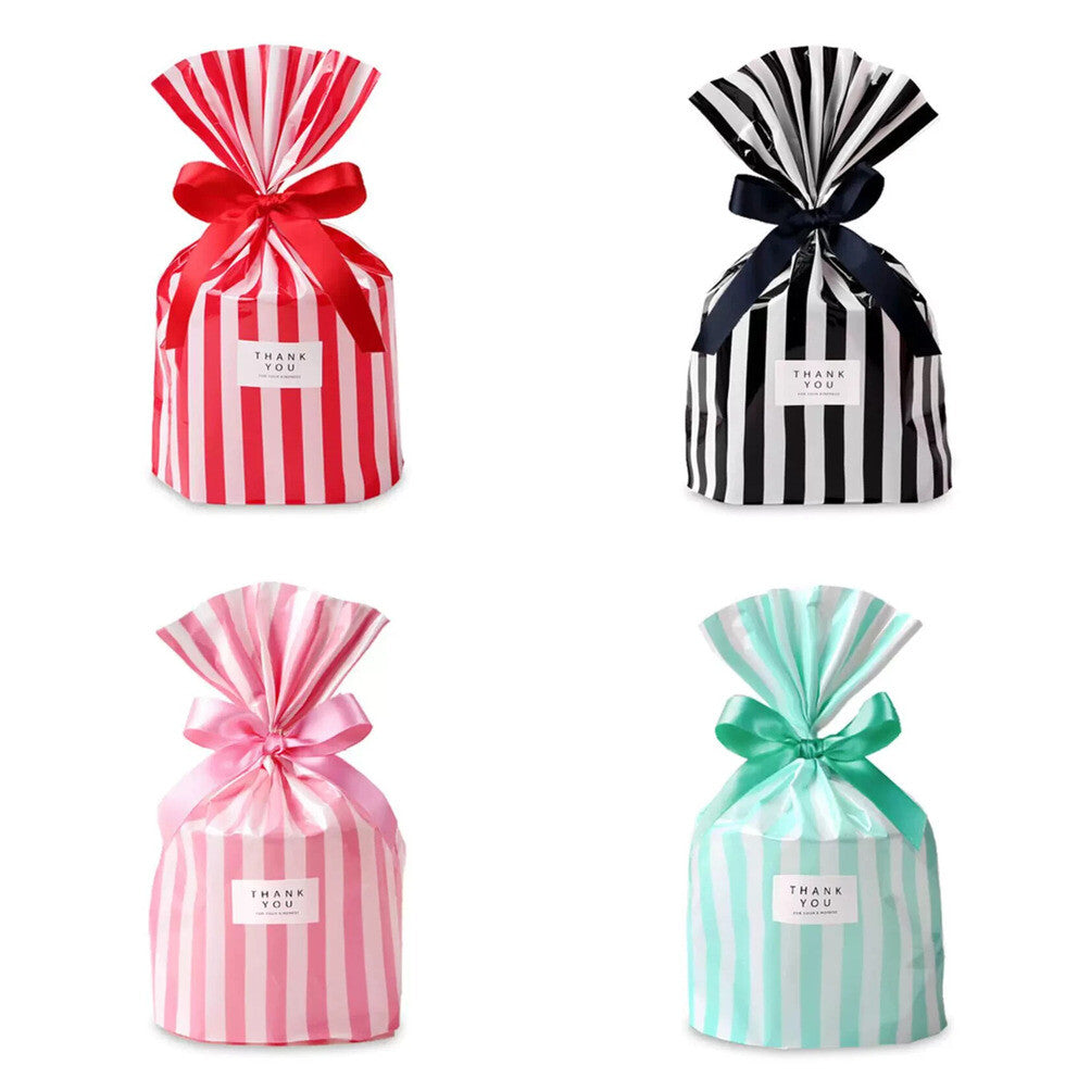All four candy-stripe gift bag colors: red, black, pink, and green