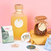 [gallery] Gold thank-you seals on a gift jar and bottle
