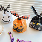 [gallery] Grid of ghost, black cat, and pumpkin bunny-ear treat bags