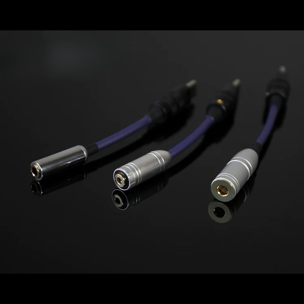 Close-up of 2.5 mm, 3.5 mm, and 4.4 mm jack openings