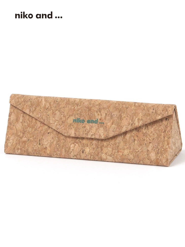 niko and... cork foldable glasses case on white background