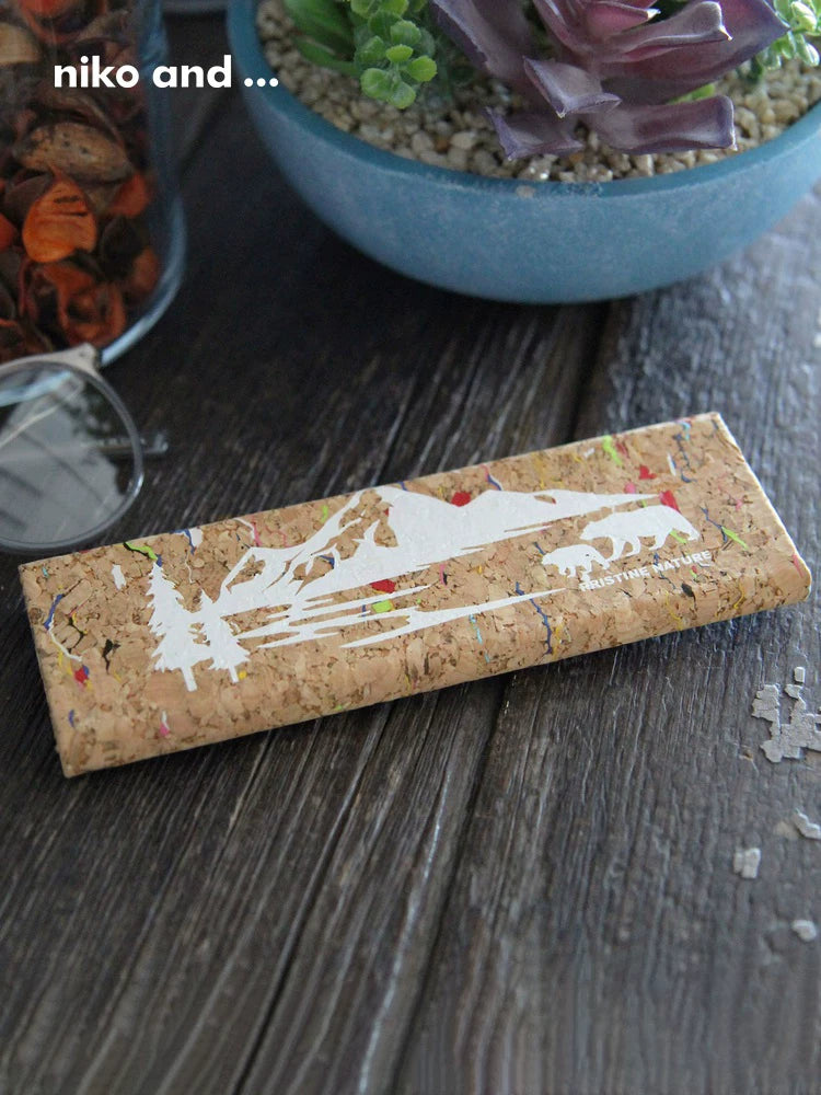 Pristine Nature cork glasses case on wood with plants